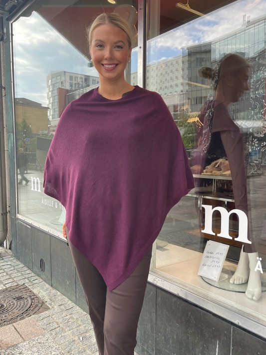 Juolas poncho, eri värejä